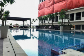 Nice Studio at Gateway Park LRT City Bekasi Apartment By Travelio
